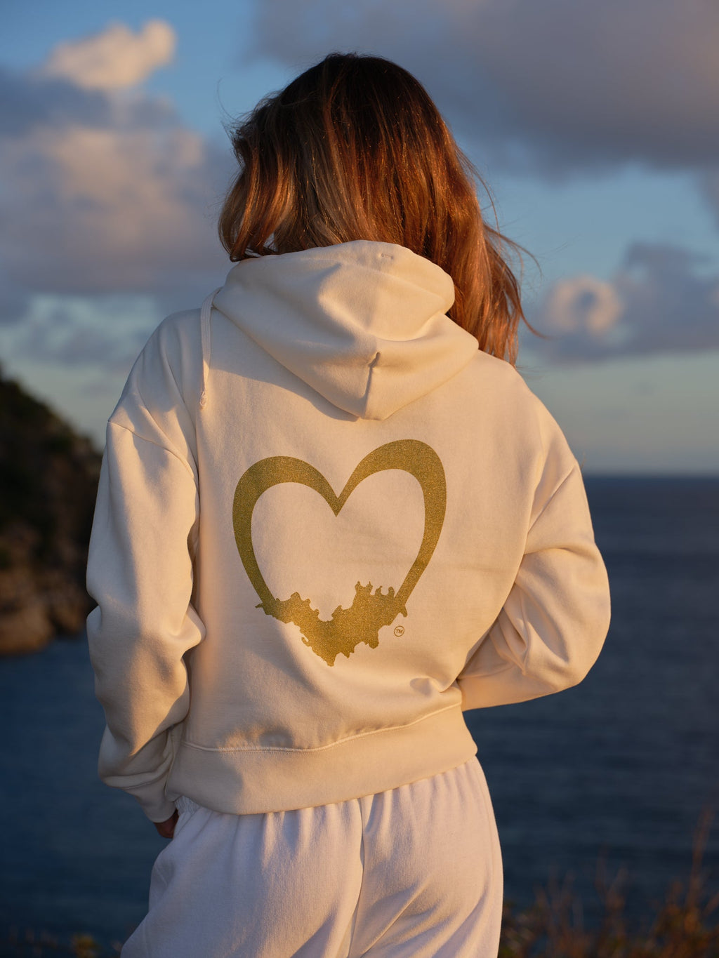 The Heart Hoodie in Ivory, hand-painted gold heart across the back